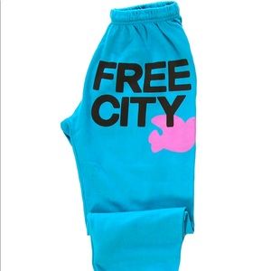 Blue Free City sweatpants with purple bird